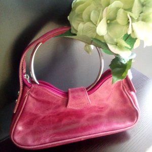 GENUINE LEATHER AVA brand handbag with custom removable floral emblem.